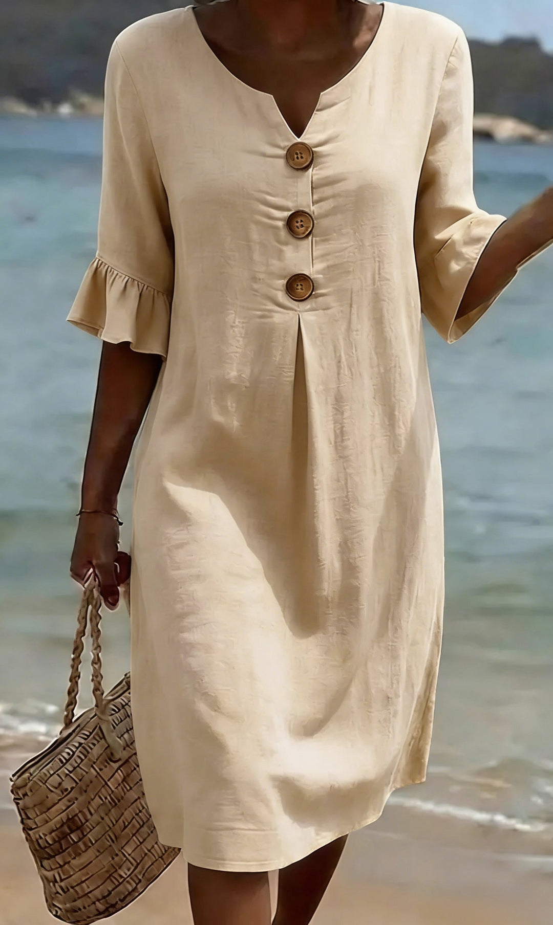 Lifestyle view of women wearing casual V-neck beach dress