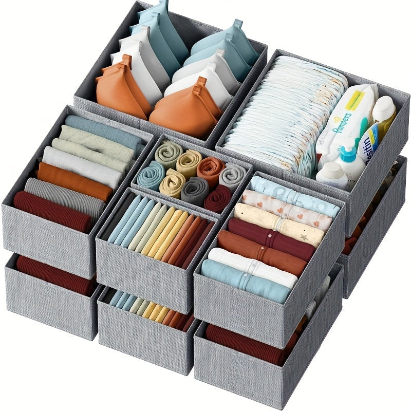 Set of 12 grey drawer storage baskets filled with folded clothes and accessories