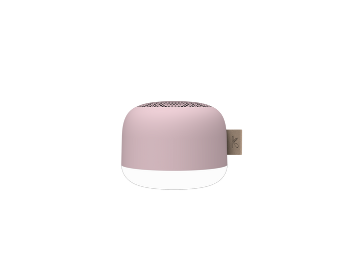 Hand holding the compact waterproof Bluetooth speaker for size reference