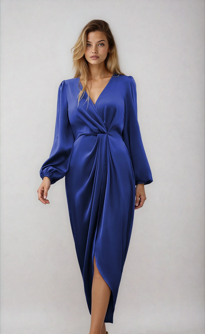 Model wearing blue long sleeve wrap midi dress with V-neck