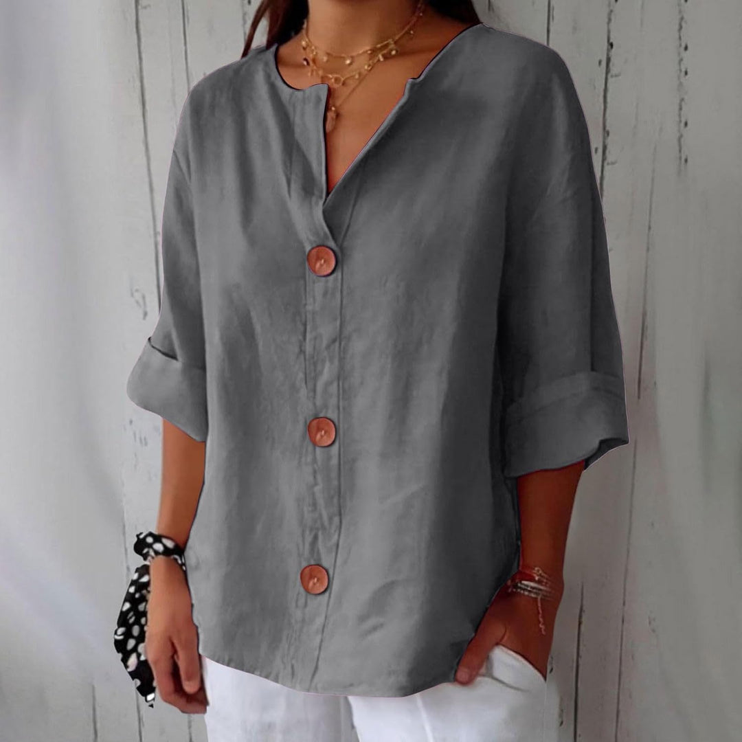 Close-up of button placket and collar on a lightweight women's blouse