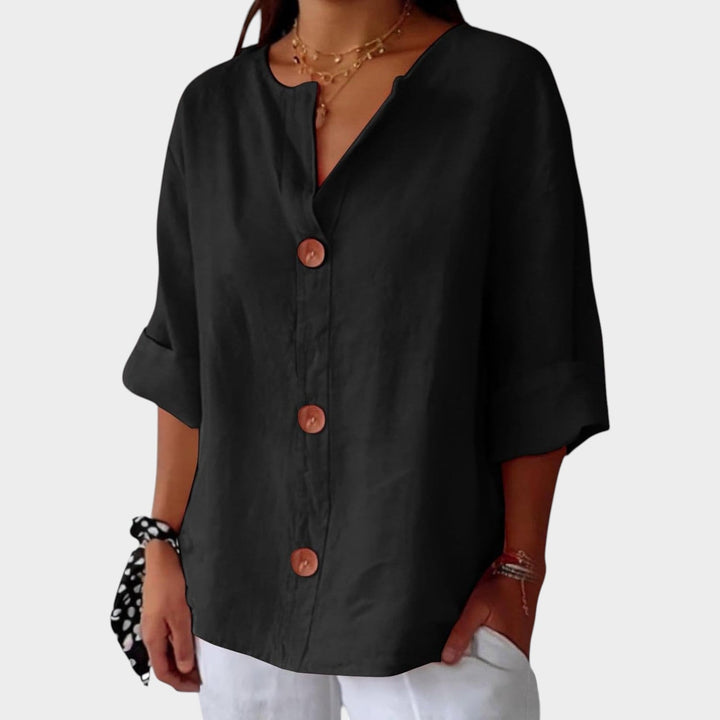 Lightweight womens button up blouse showcasing classic collar and sleeve detail