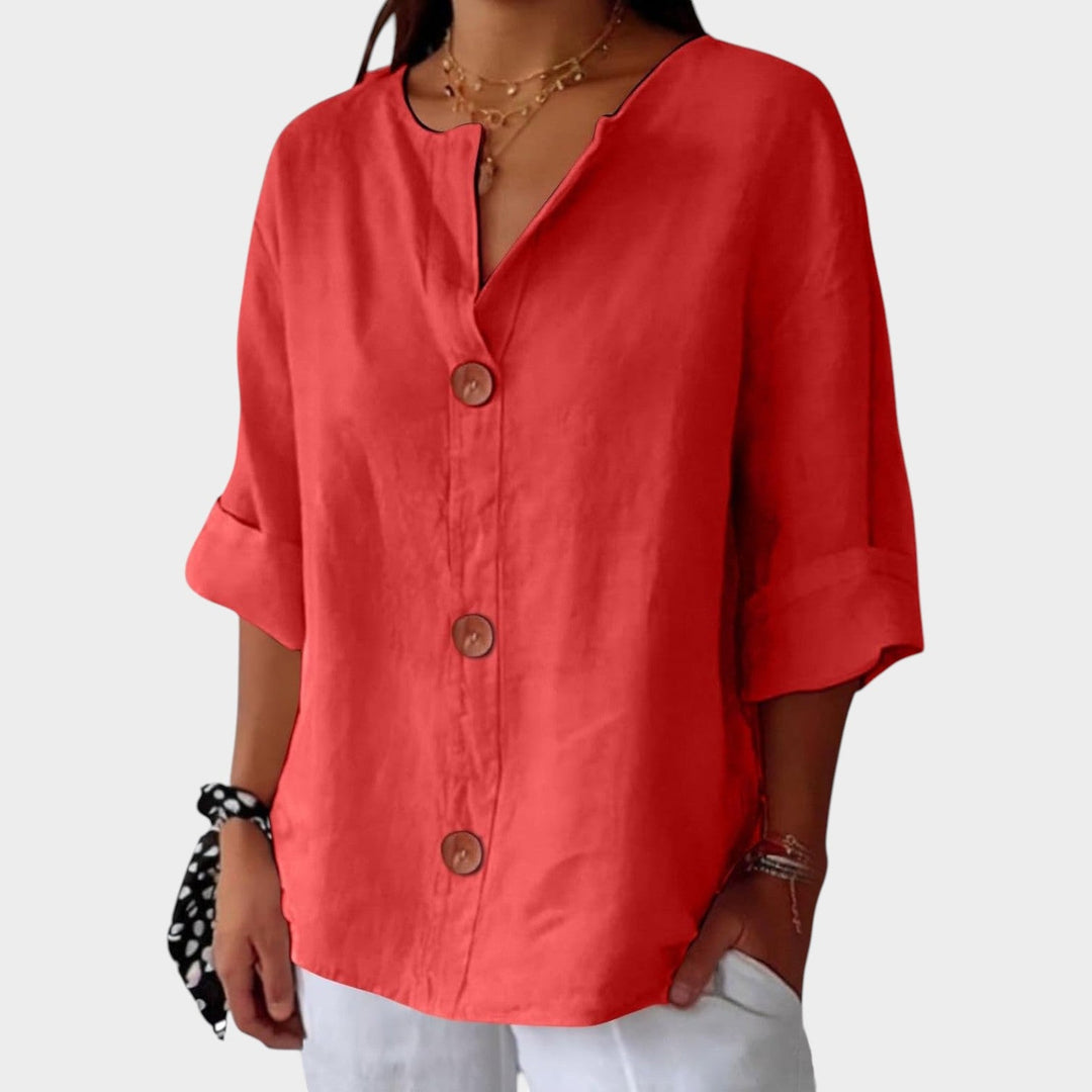 Comfortable womens top with button front closure and three quarter length sleeves