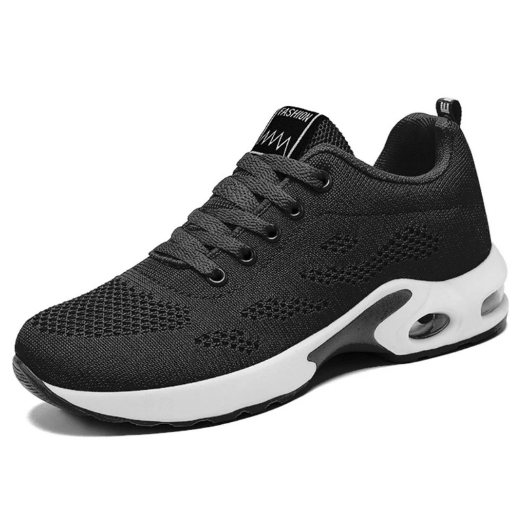 Angled shot of casual comfort sneakers for women highlighting ergonomic design and lightweight build.