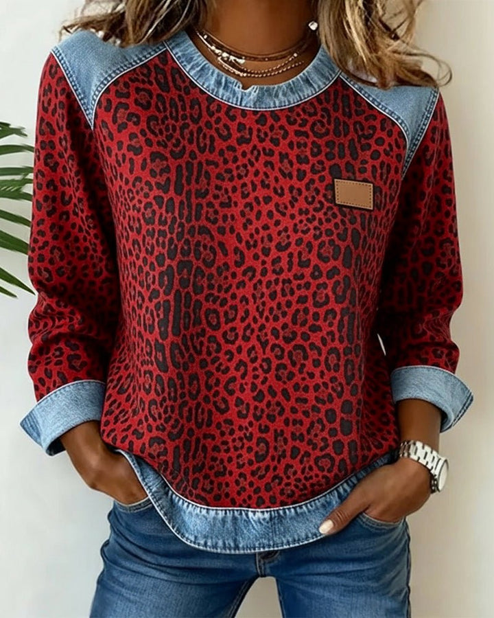 Close-up fabric texture of women's leopard print knit sweater