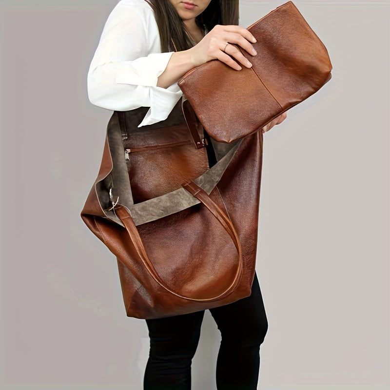 Woman holding brown soft tote bag and matching clutch