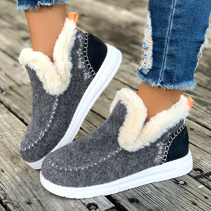 Plush house shoes for women showcasing cozy winter warmth and comfort