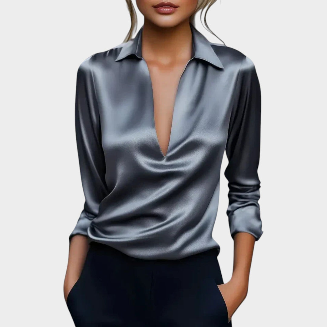 Woman wearing the sleek gray V-neck classic collar blouse