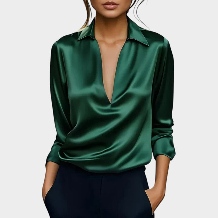 Woman wearing the emerald green V-neck classic collar blouse