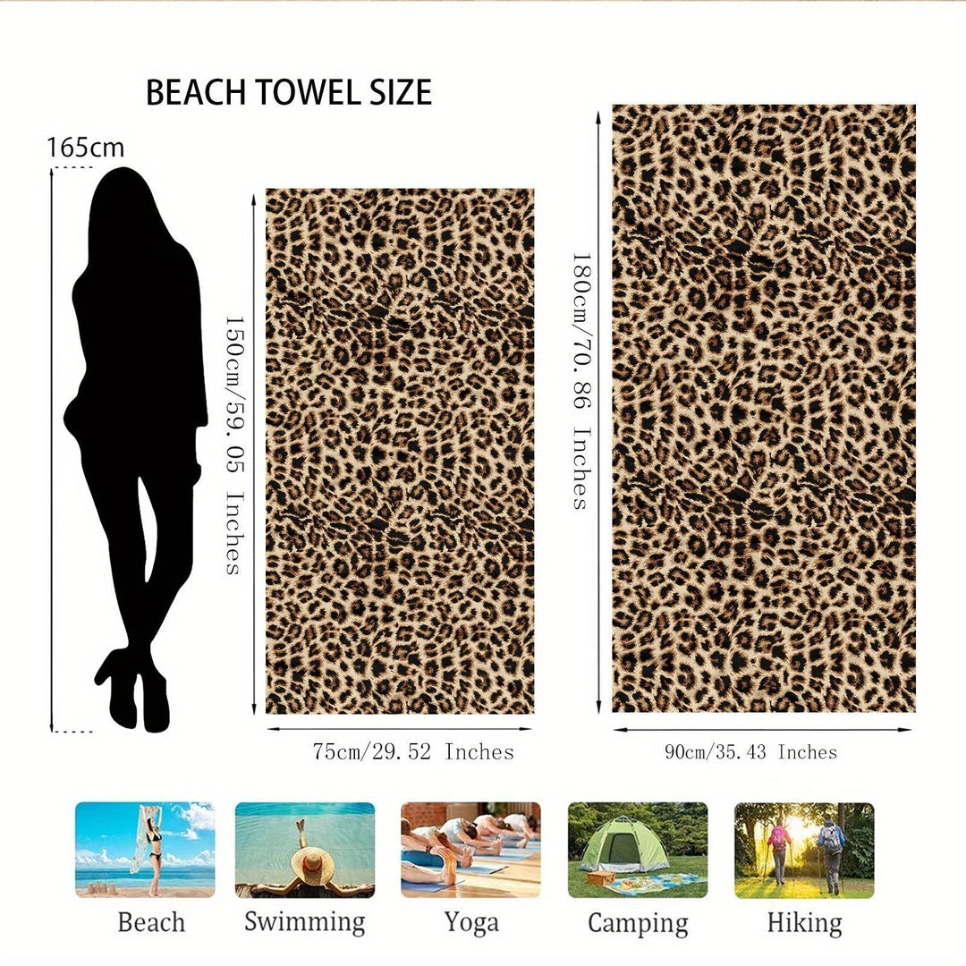 Lightweight travel towel with stylish pattern spread out on sand