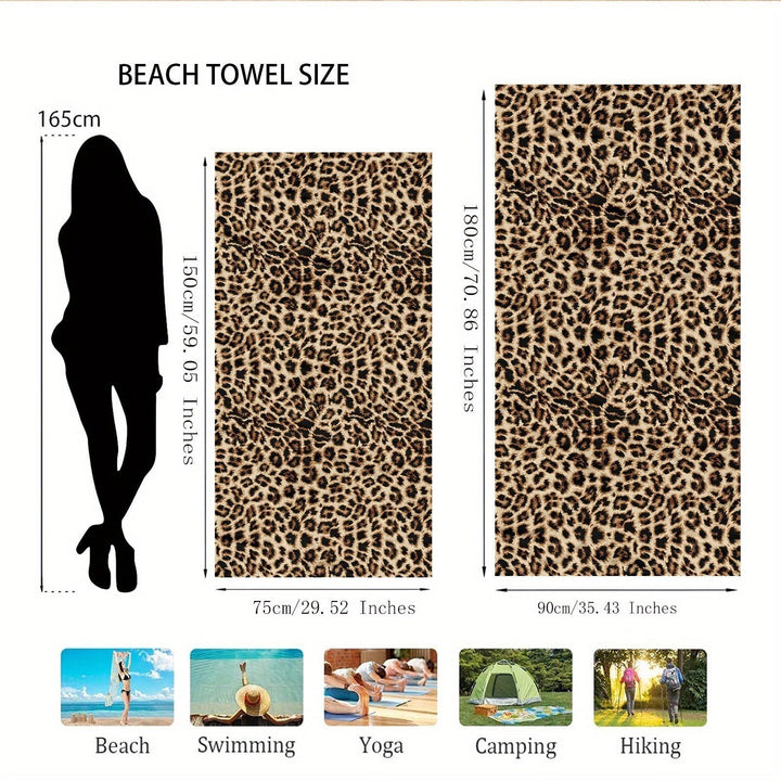 Lightweight travel towel with stylish pattern spread out on sand