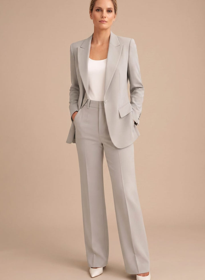 Close-up of the premium fabric texture on the tailored office blazer