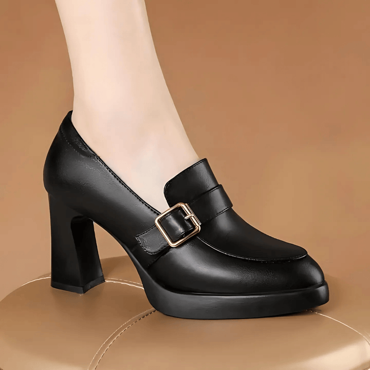 Black elegant orthopedic pump shoe with decorative buckle and block heel