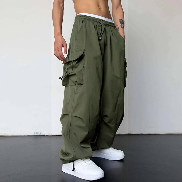 Relaxed fit trousers back view showing structured pocket stitching detail
