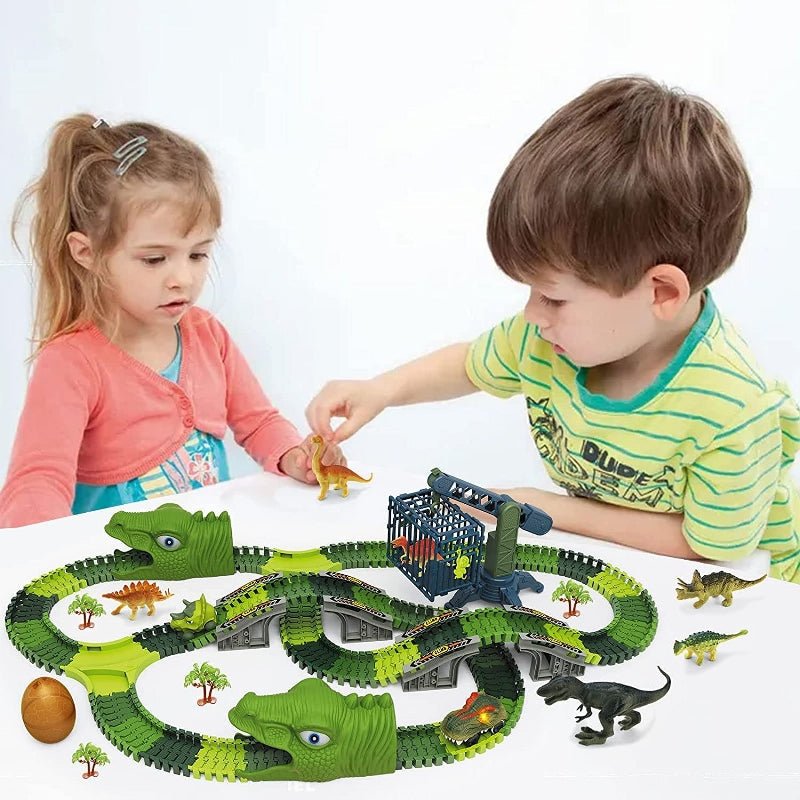 Children playing and building with the custom dinosaur race track
