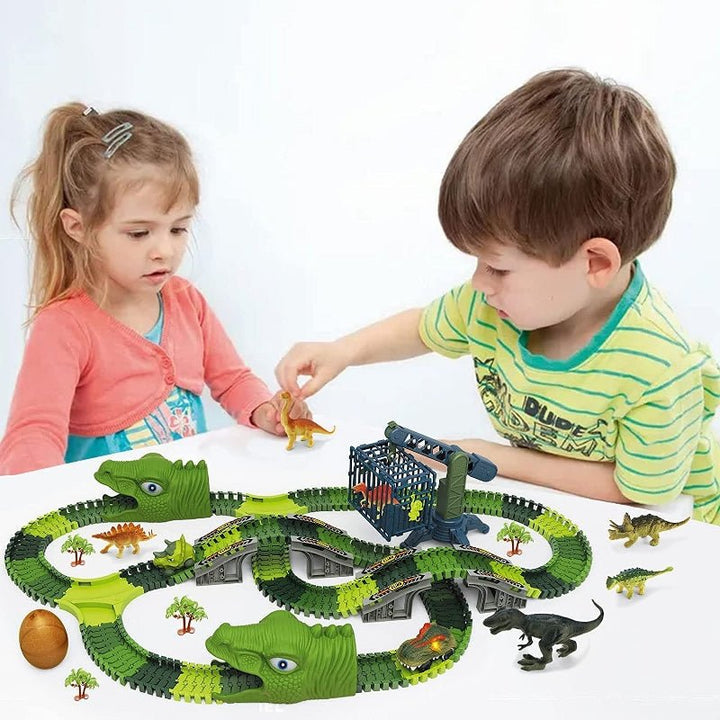 Children playing and building with the custom dinosaur race track