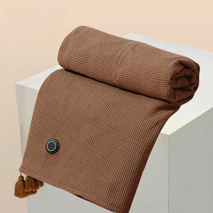 Close-up of electric wrap fabric showing controller button for adjustable heating levels