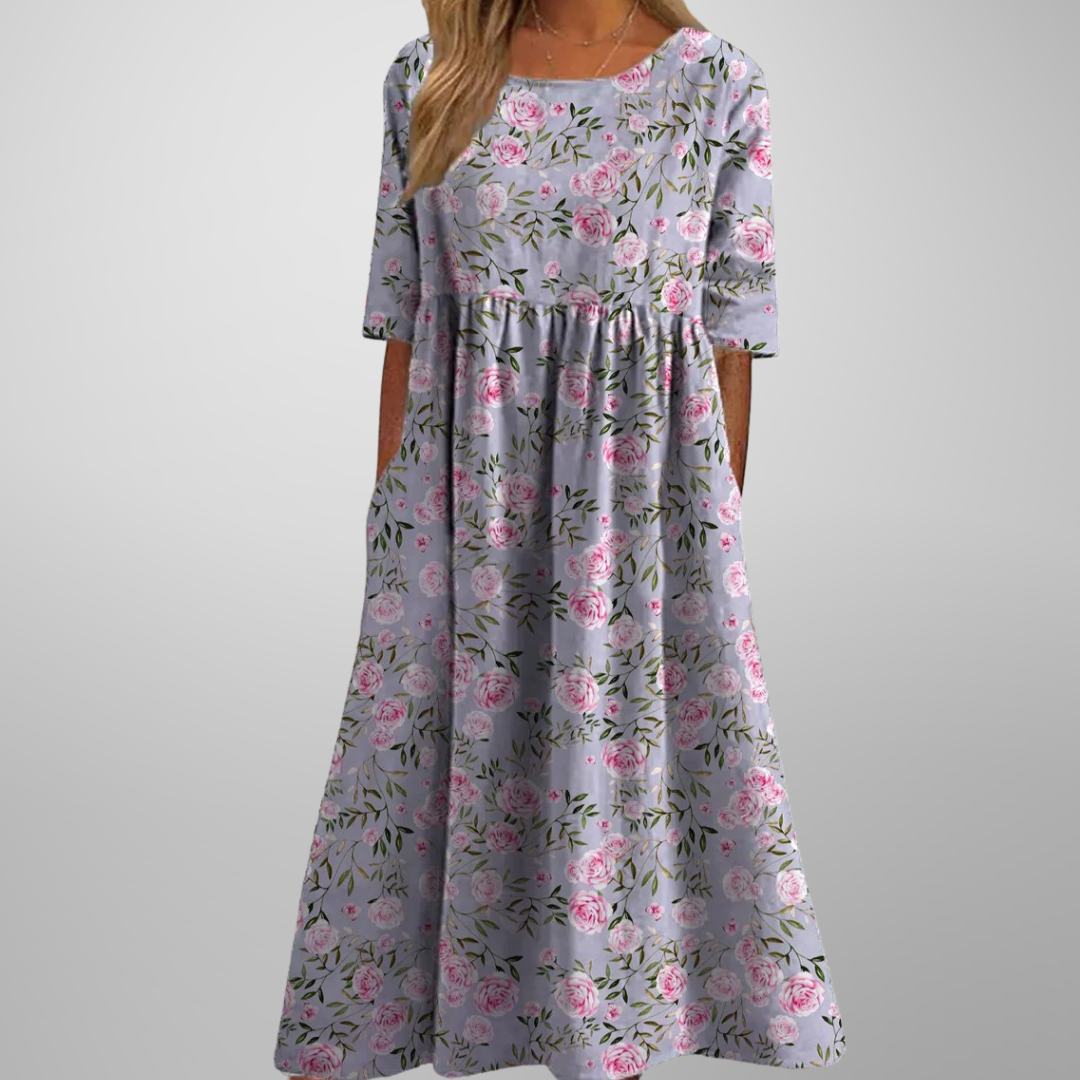 Short-sleeve botanical print dress styled for warm weather casual wear
