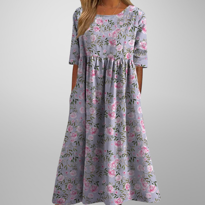 Short-sleeve botanical print dress styled for warm weather casual wear