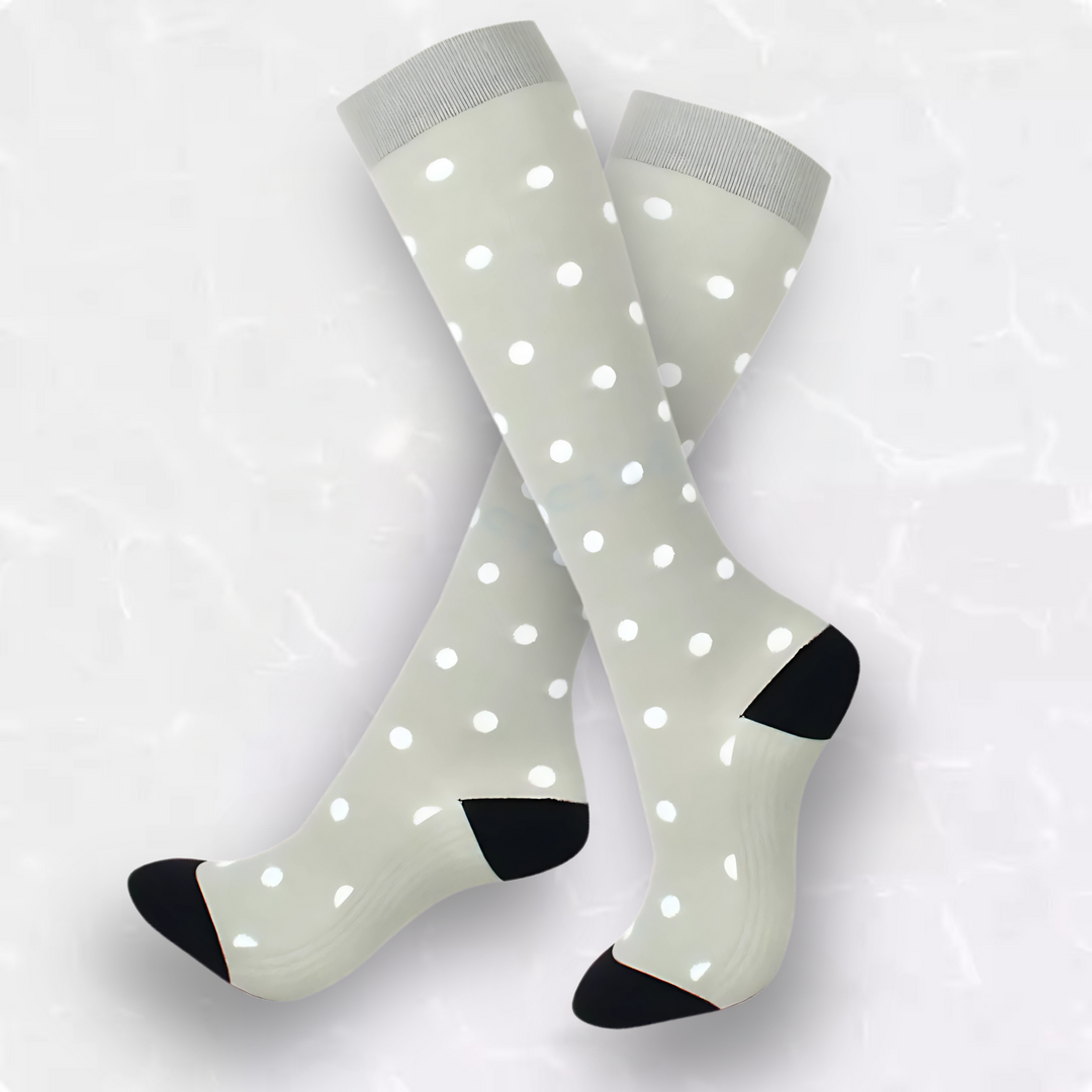 Supportive athletic compression socks with polka dot pattern for travel