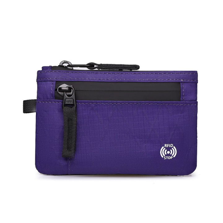 Small zippered card holder for minimalist travel
