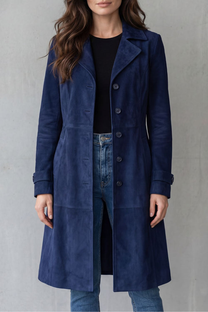 Close-up fabric detail of the elegant women's classic long coat showing winter fashion texture
