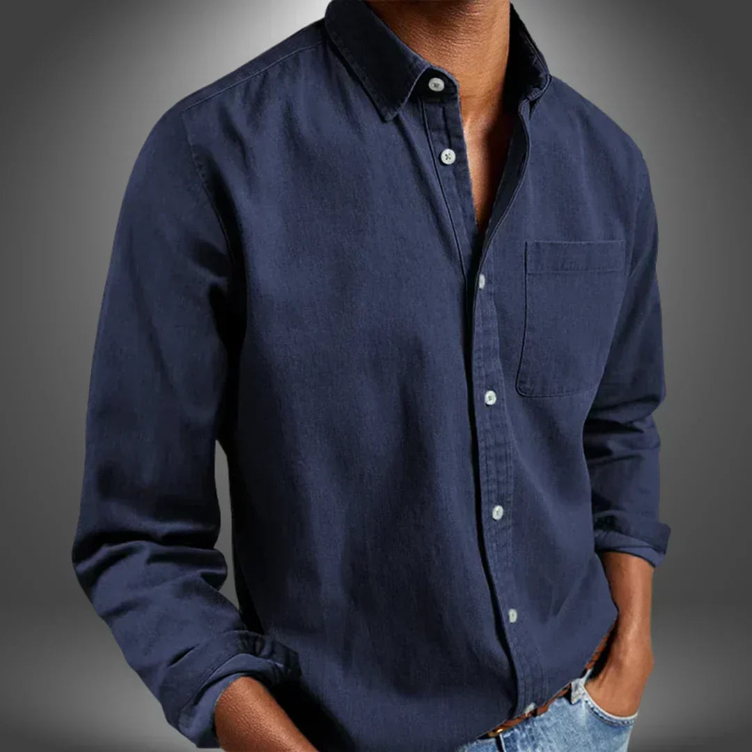 Man wearing navy blue button-up shirt