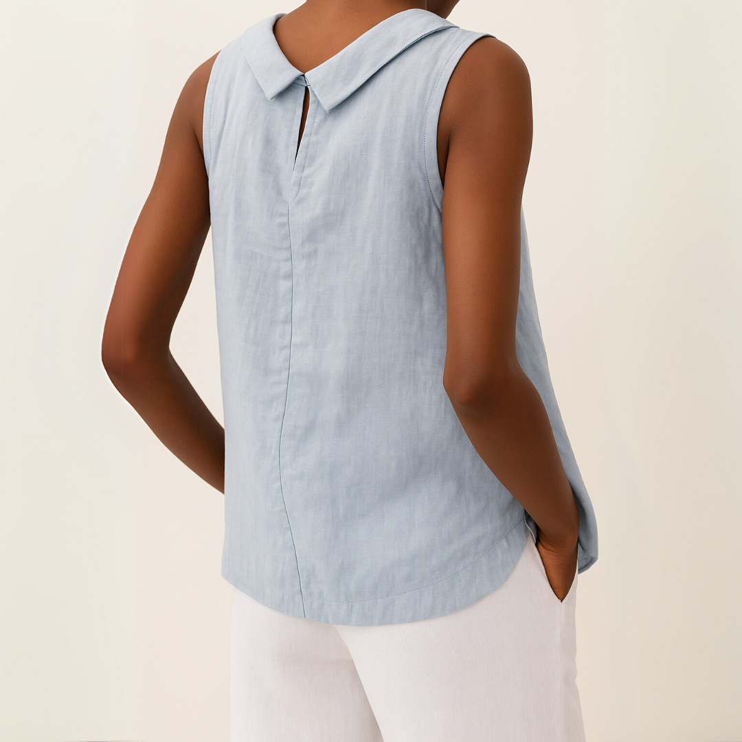 Back view of a model wearing a light blue sleeveless roll collar relaxed summer top