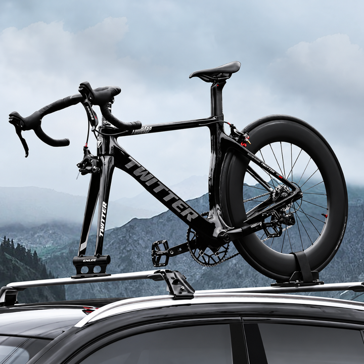 Close-up of bike carrier fork mount adapter securing front bicycle wheel area
