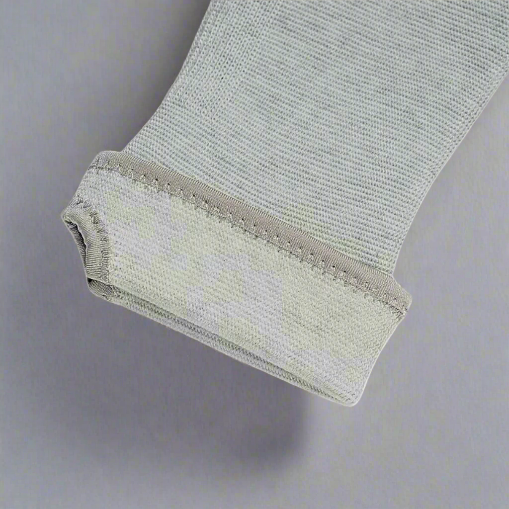 Grey unisex wrist support compression sleeve for joint relief and arthritis