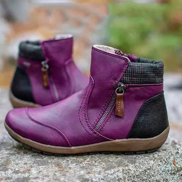 Close-up of waterproof ankle boots for women displaying durable tread sole and comfort design