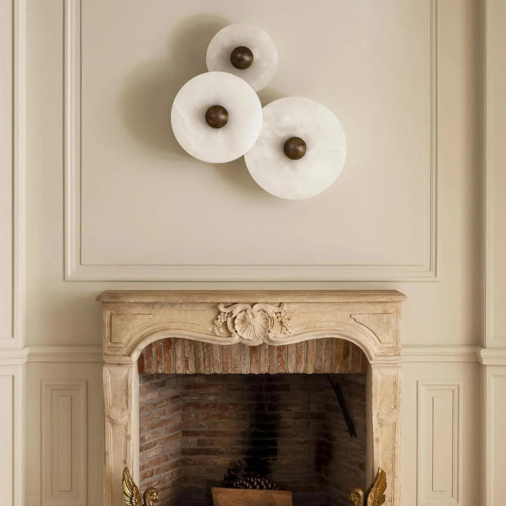 Sleek wall sconce featuring genuine alabaster for warm lighting in home decor