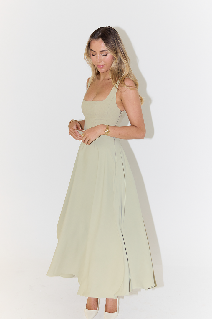 Fabric detail of the solid green summer women's dress