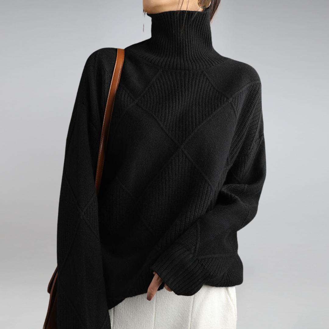 Woman wearing a black turtleneck knit sweater with a shoulder bag
