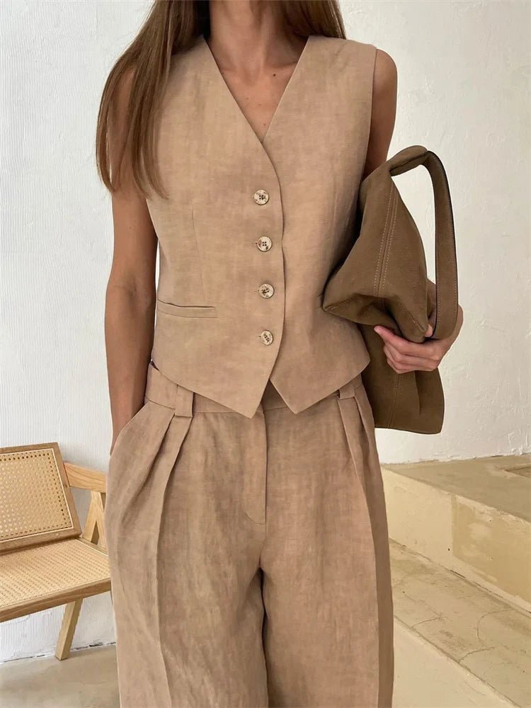 Detailed shot of the front button closure on the elegant vest