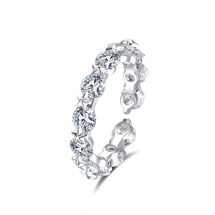 Close-up of a silver zirconia stacking ring with star motifs