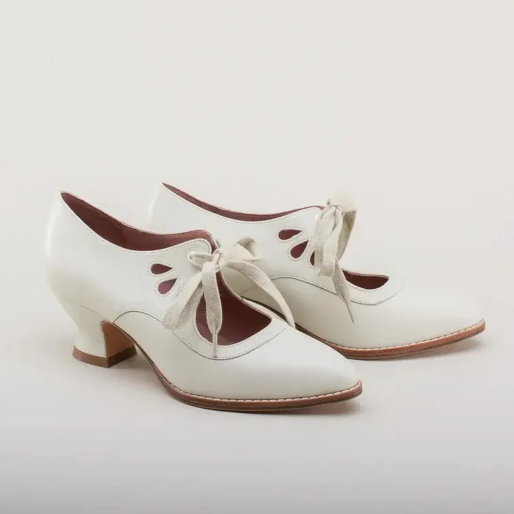 Top-down view of women's orthopedic low heels displaying soft interior lining and cushioned footbed.