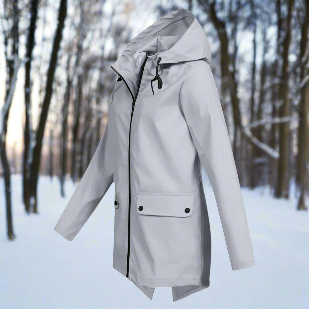 Close-up of waterproof zipper and sealed seams on women's rain coat
