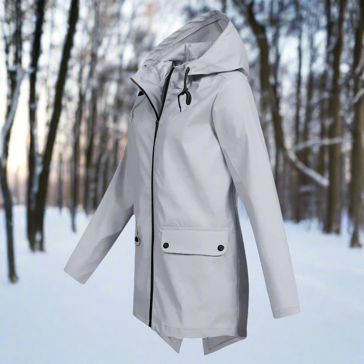 Close-up of waterproof zipper and sealed seams on women's rain coat