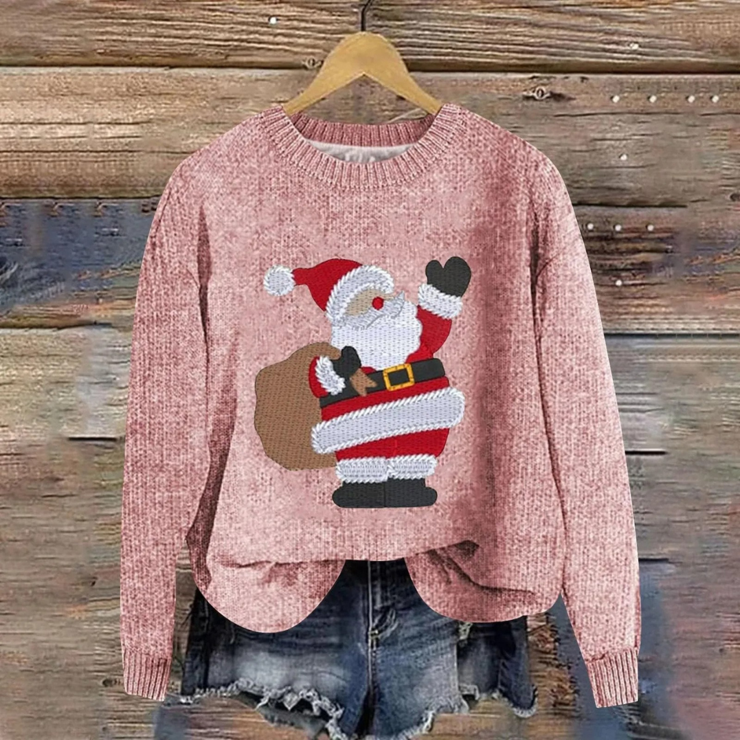 Close up fabric texture of cozy winter jumper with red and white festive knit patterns