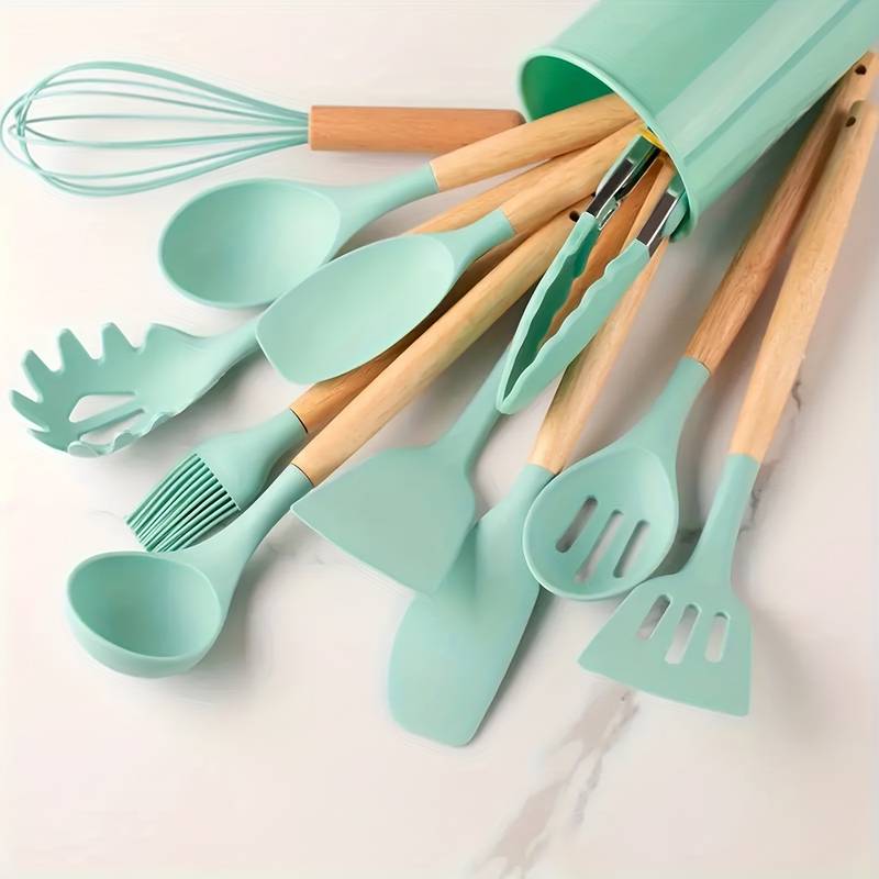 Dishwasher safe kitchen accessories laid out on a modern countertop