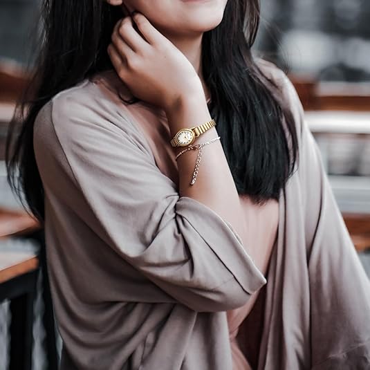 Lifestyle view of the Romy women's elegant mini watch worn on a wrist