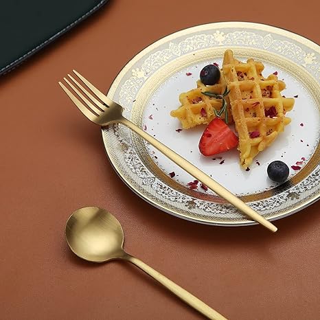 Polished metal surface detail of the stainless steel dining tableware
