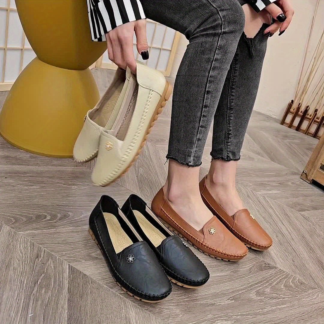 Assorted color options of the women's soft loafers displayed together on a neutral surface.