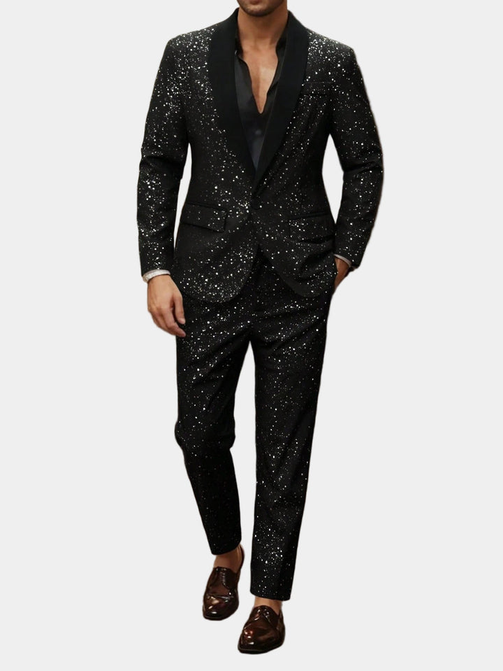 Man wearing black glitter suit jacket and trousers