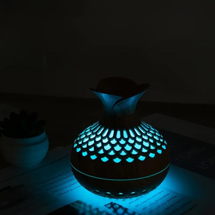 Aromatherapy essential oil diffuser emitting fine mist in living room
