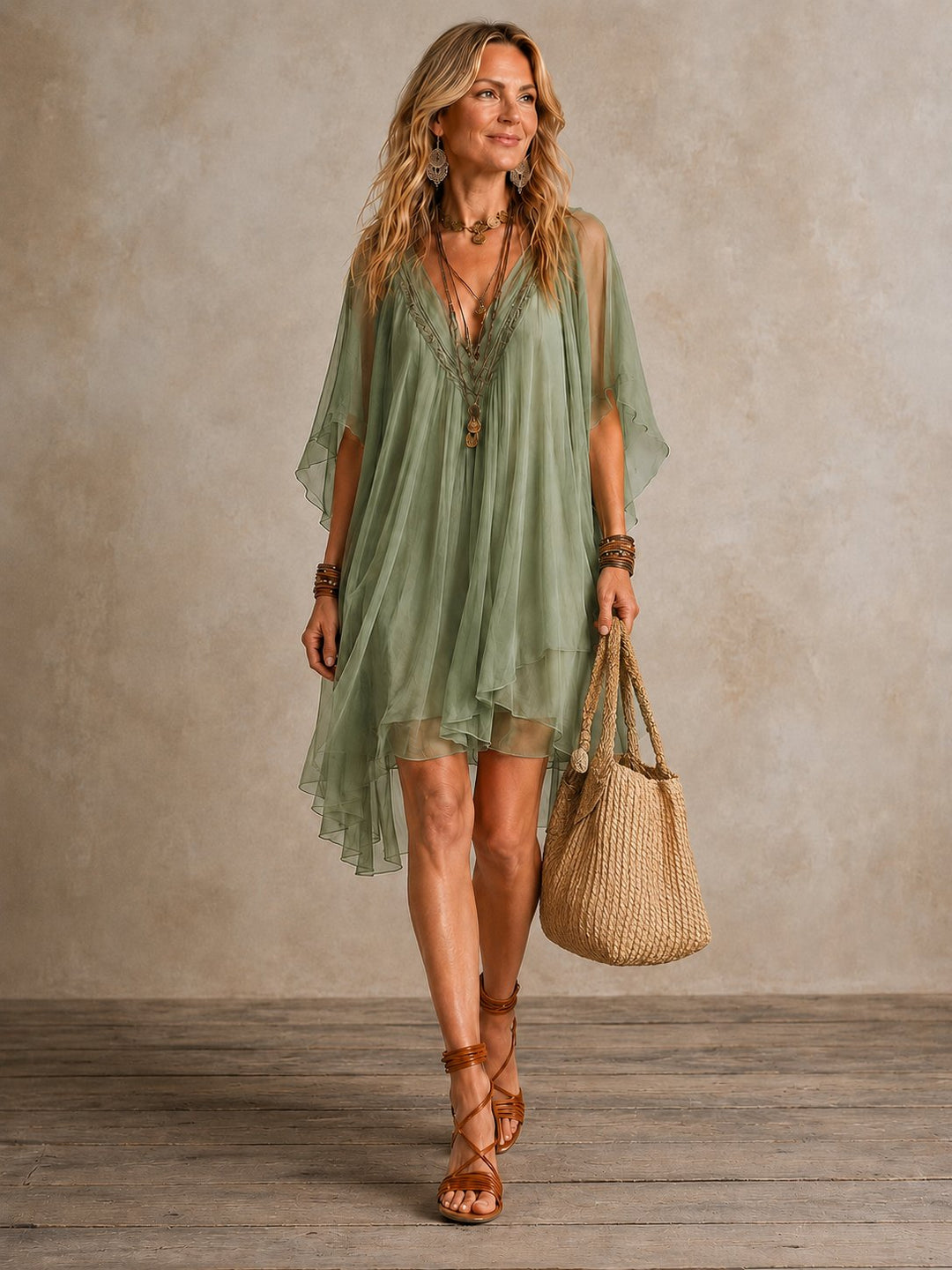 Women's green flowy mini dress featuring a flattering V-neckline for casual summer wear