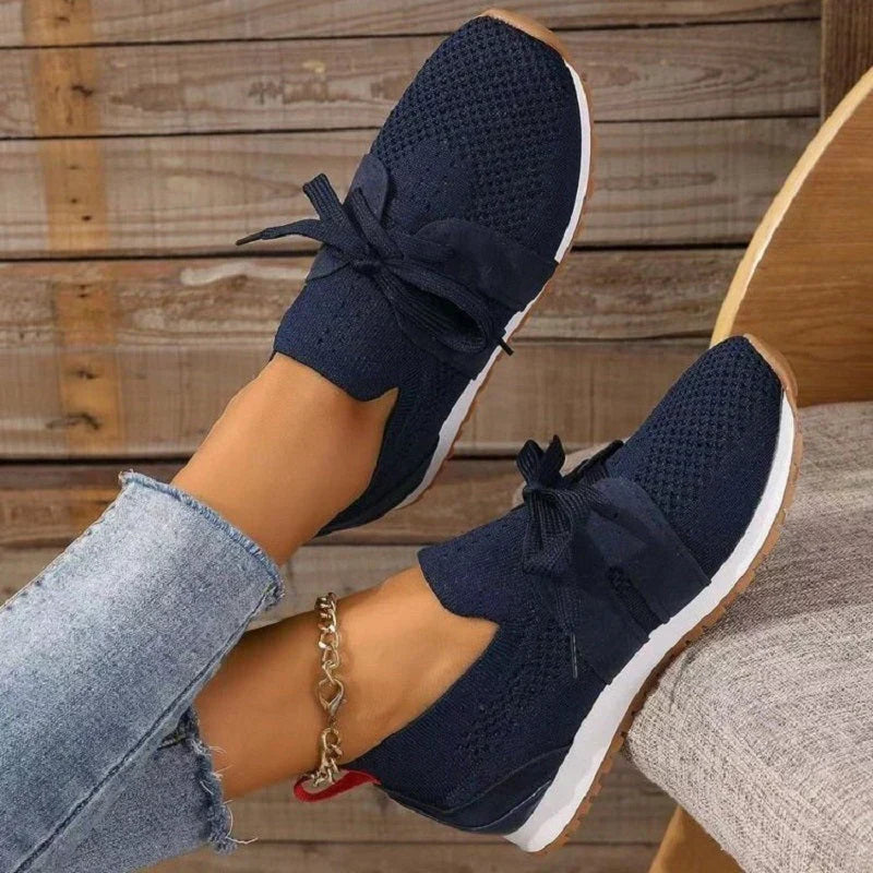 Blue women's orthopedic comfort heeled shoes paired with jeans