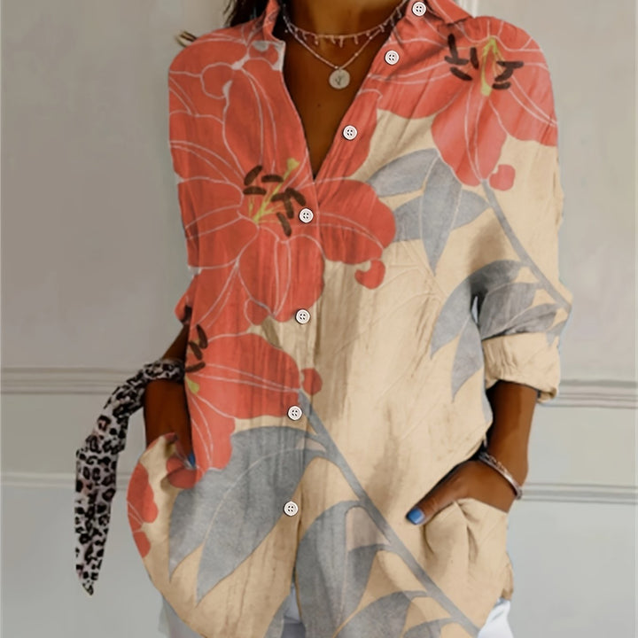 Women's retro floral V-neck blouse in apricot, showcasing long sleeves and casual wear style.