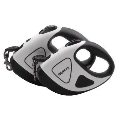 Two retractable LED dog leashes in white with ergonomic handles